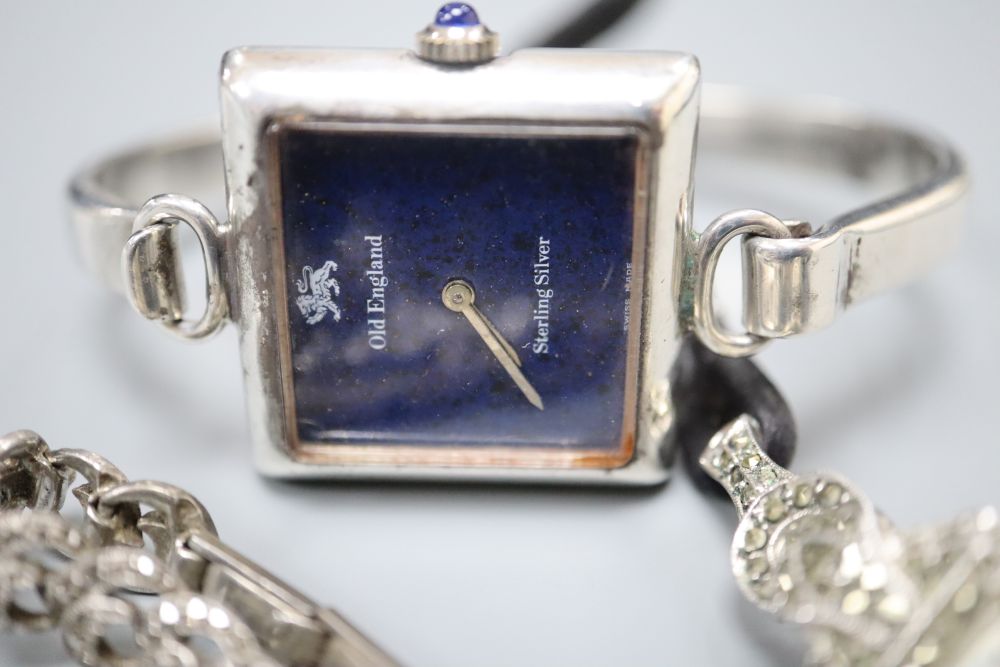 Three ladys assorted silver cocktail wrist watches and a sterling watch.
